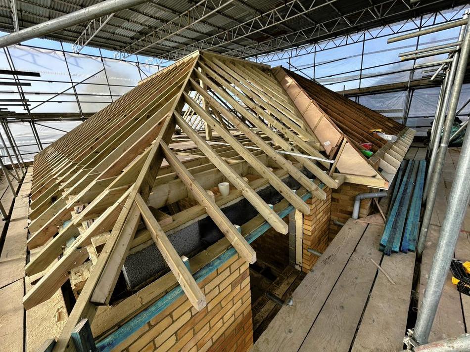FMB member installing a new roof