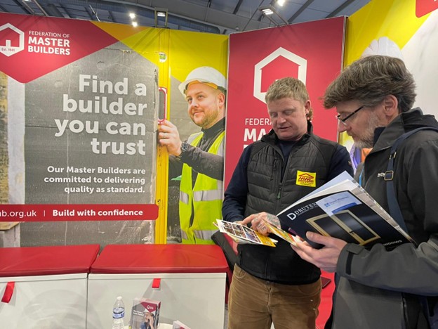 Members speak to clients at the Edinburgh Homebuilding & Renovating Show