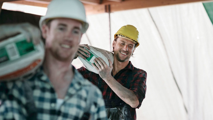 iStock-builders carrying stuff.jpg