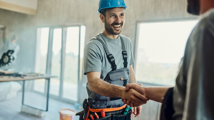Builder shaking hands with client - getting paid header.jpg