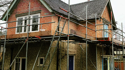 White Cube Construction South East Ltd during pebbledash removal.jpg