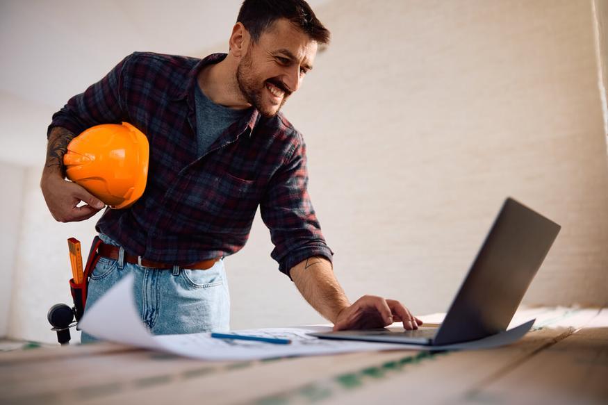 Builder with laptop