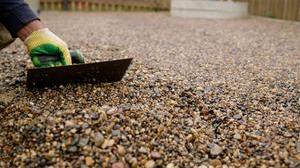 Leveling resin gravel driveway.jpg